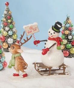 Oh What Fun! Reindeer Pulling Snowman On Sled
